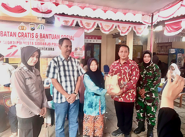 Pengobatan Gratis dan bantuan sosial digelar Polsek Sedati dalam rangka menyambut Hari Bhayangkara ke-79.